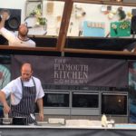 head chef working in an outdoors events kitchen