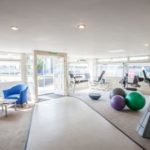 yoga and gym equipment in a room