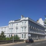 Victorian building with bright blue sky