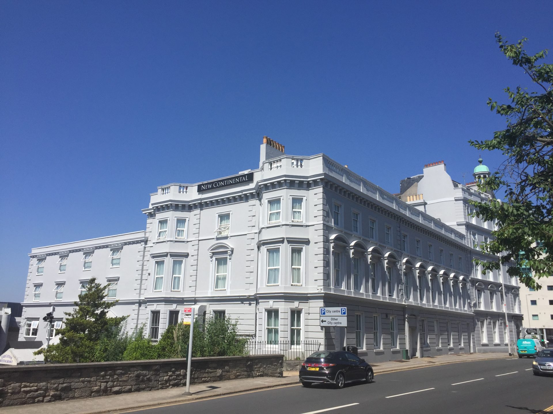 Victorian building with bright blue sky