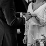 husband and wife exchanging wedding bands