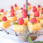 cake stand full of cakes with strawberries