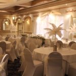 hotel room decorated for prom with feathers