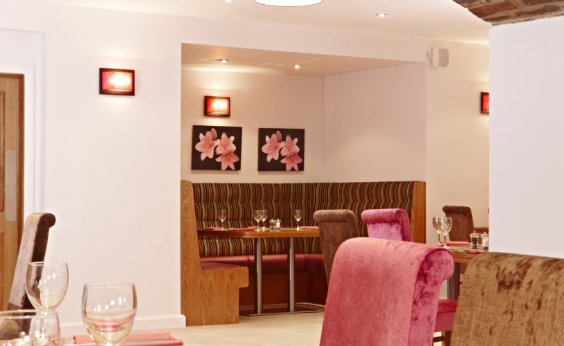 restaurant with pink chairs