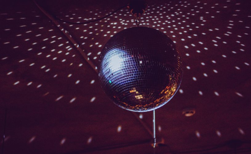 glitter ball with purple background